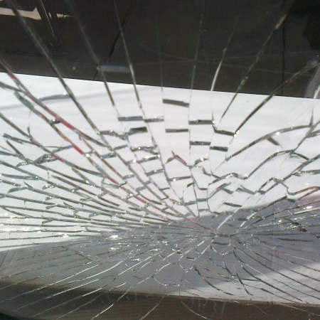 A glass window, shattered
